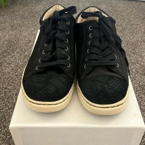 Ugg sneakers, black with fur lining, size 8 1/2, good condition.